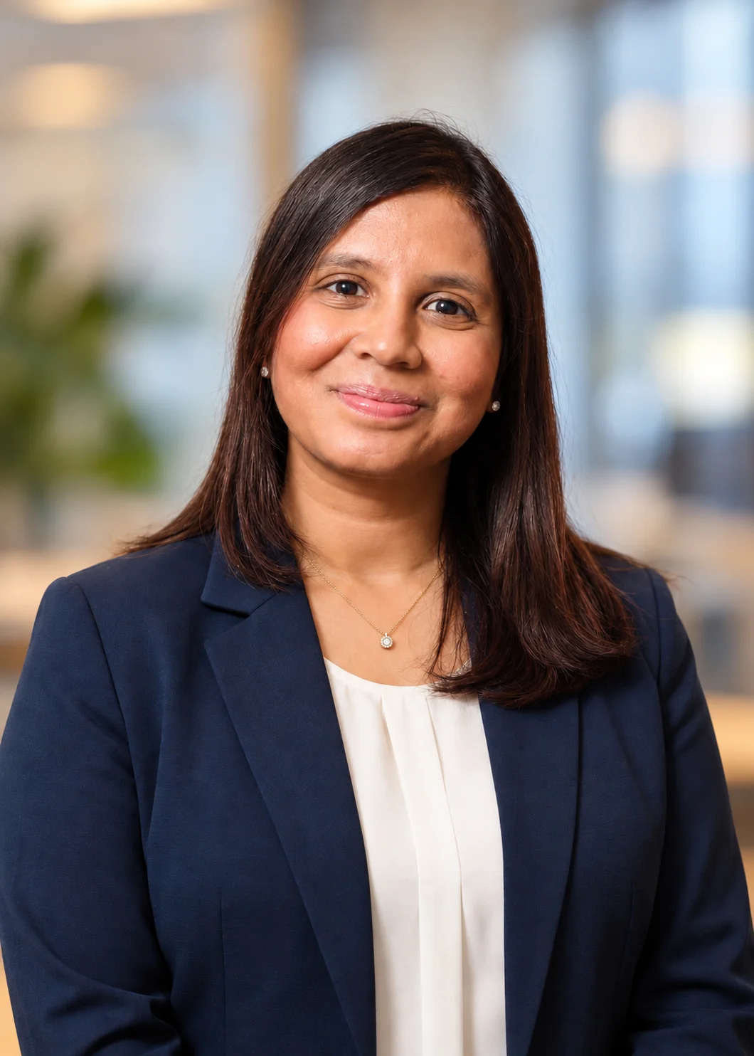 Professional headshot of Riddhi Patel